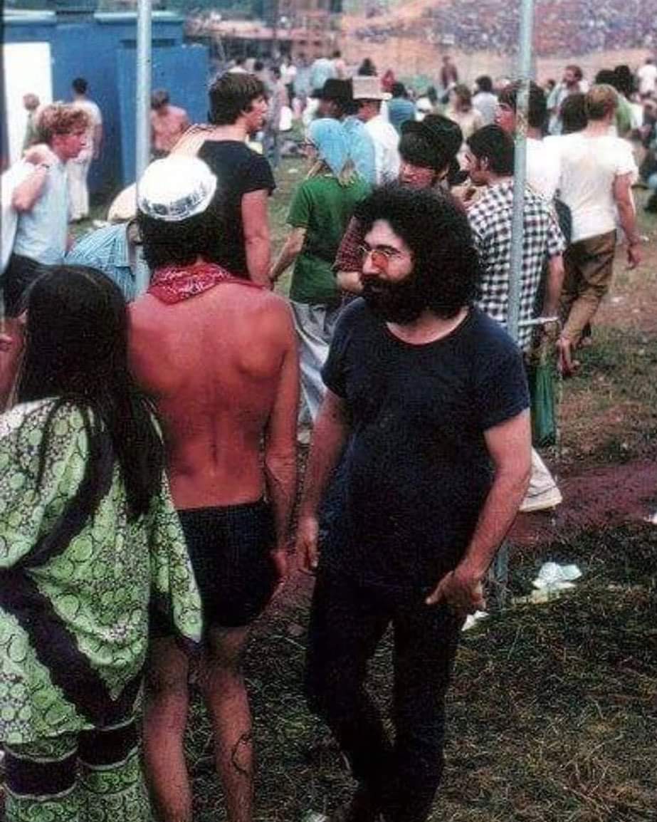Jerry  walking  thru the crowd  at the original  Woodstock,,,