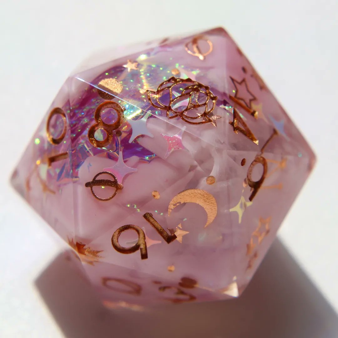 Helichrysumdice's tweet photo. Hello, that's me, the one that always forget to post on this app 👀
Here's a chonk that I made (and that's available too, shh) ✨
#handmadedice #dicemaker #pink #stars #dnd5e #dnd #rpg #d20 #dice #artisandice https://t.co/H3UmSYbL03