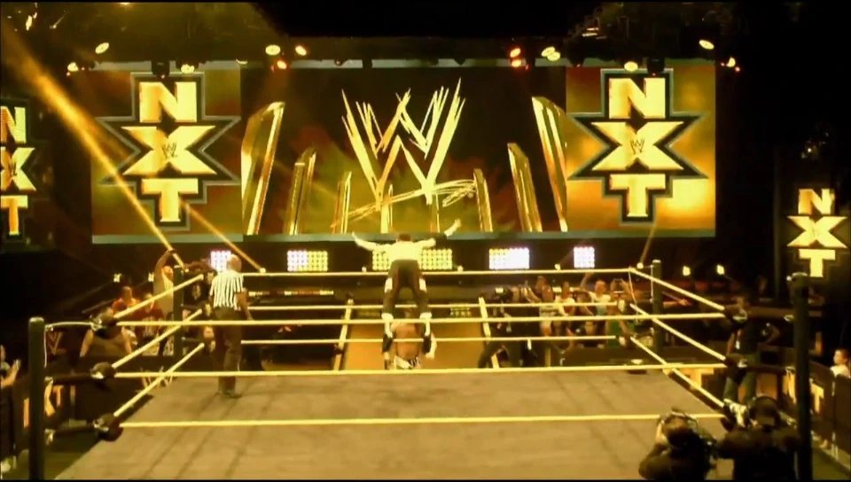 Which wrestler comes to mind first when you see the original NXT logo?