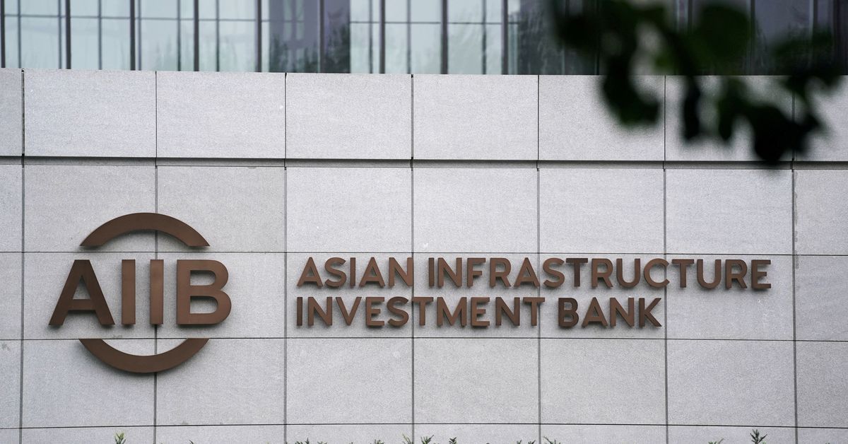 Reuters's tweet photo. Canada freezes ties with China-led AIIB, probes allegations of Communist domination https://t.co/KNFKcgchWm https://t.co/yxlfHa6TRF