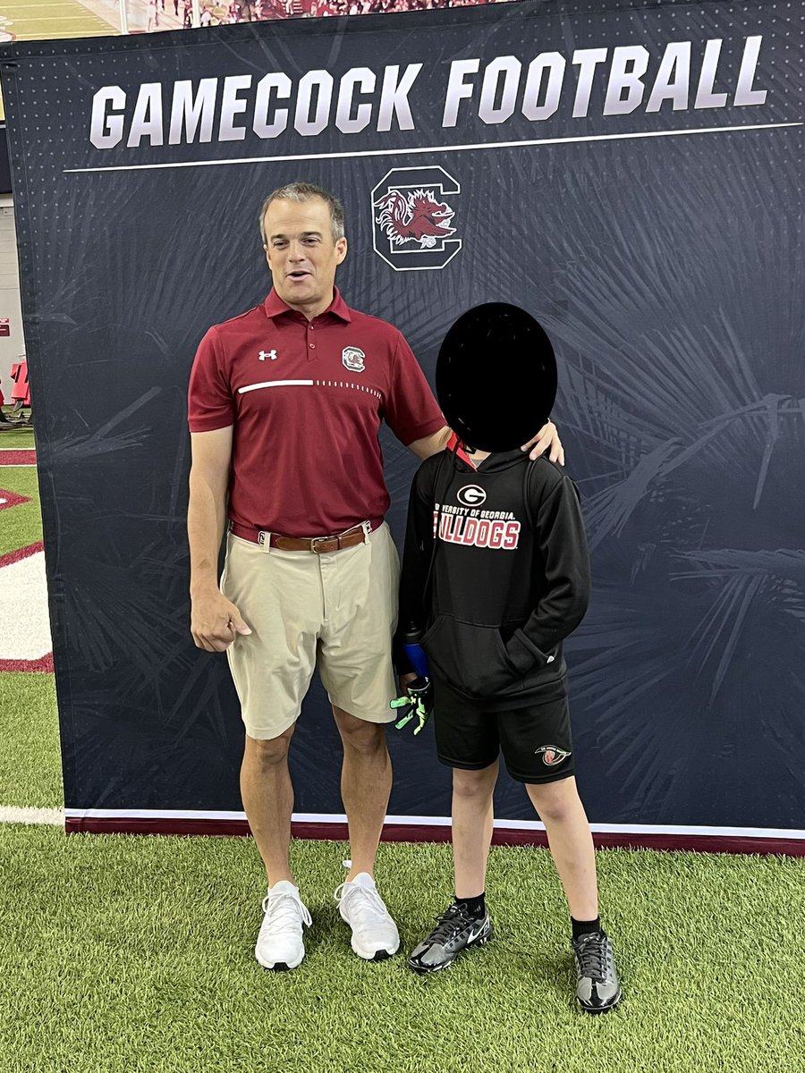 ConstantEdwin's tweet photo. My friend, sadly, went to Georgia and is a huge UGA fan. As is his son. His son met @CoachSBeamer while wearing the worst hoodie ever. https://t.co/ukYchljlNn