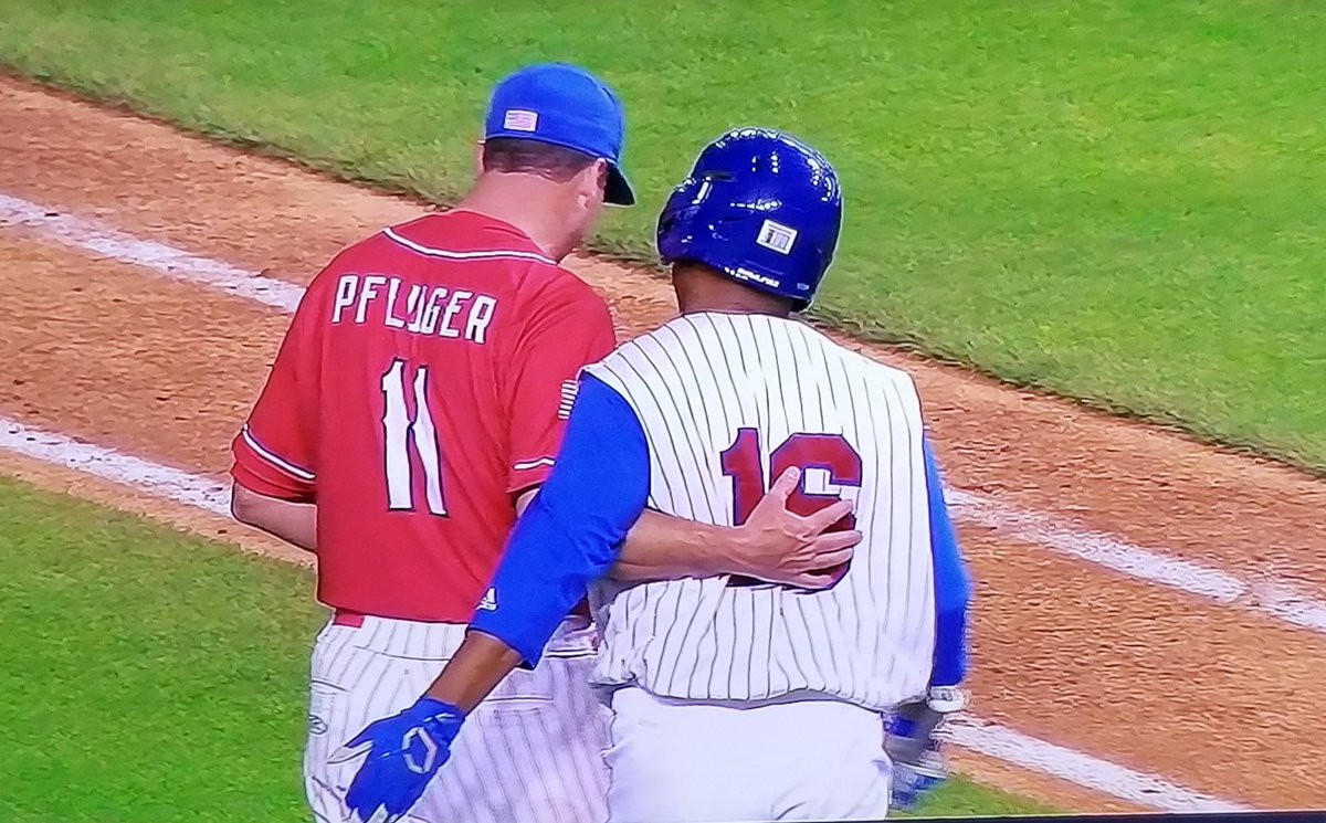 elbrookman's tweet photo. #CongressionalBaseballGame
#Republicans are currently winning 14 to 6 over the #Democrats
The play of the game so far ...After getting hit by a pitch, #DonDavis, the touchy-feely Democrat from North Carolina cops a feel off Republican pitcher #Pfluger on his way to first base. https://t.co/5WJ5YYqYLe
