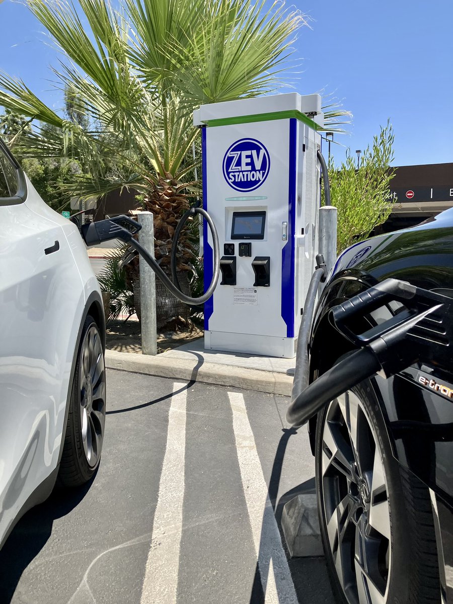 ZEVStation's tweet photo. @ZEVStation updates it’s ‘proof of concept’ site in downtown City of Palm Springs for LD &amp; MD. Brand new 120kw dual CCS charging, updated software (+ branding) EV charging with two Teslas (NACS), a Lucid and an Audi E-Tron. We charge them all! Also shown is ZEV Fleet trucks! https://t.co/YjfepCRvF4