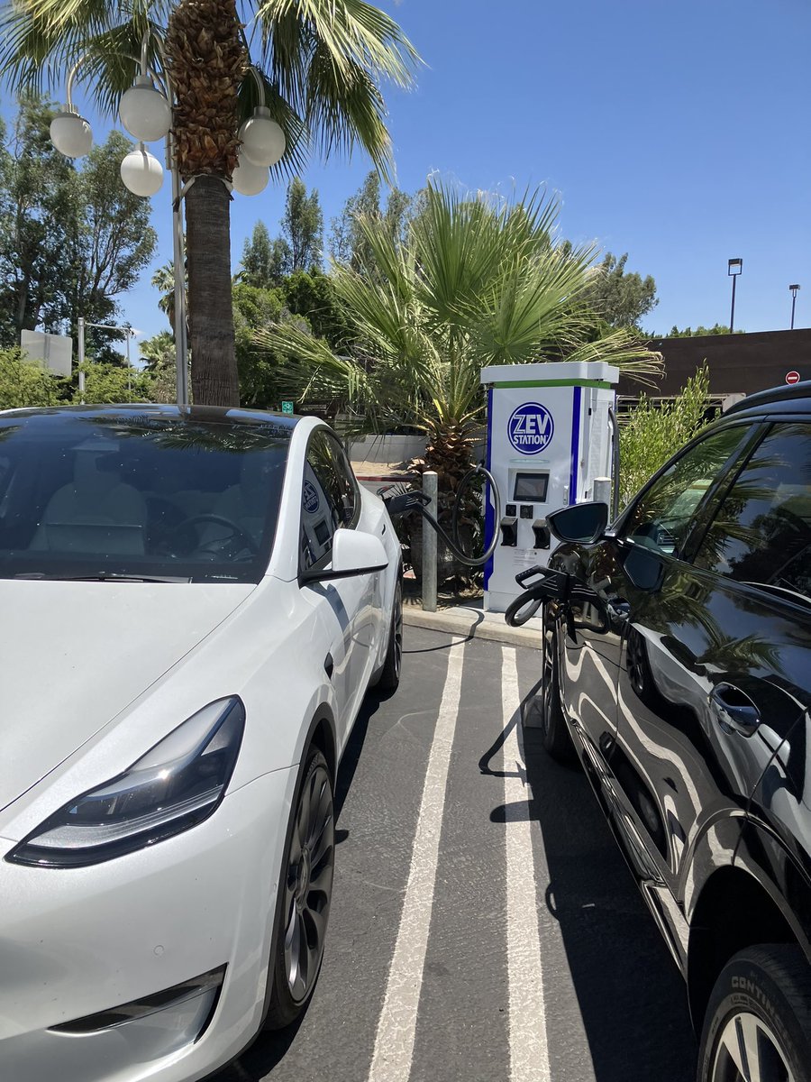 ZEVStation's tweet photo. @ZEVStation updates it’s ‘proof of concept’ site in downtown City of Palm Springs for LD &amp; MD. Brand new 120kw dual CCS charging, updated software (+ branding) EV charging with two Teslas (NACS), a Lucid and an Audi E-Tron. We charge them all! Also shown is ZEV Fleet trucks! https://t.co/YjfepCRvF4