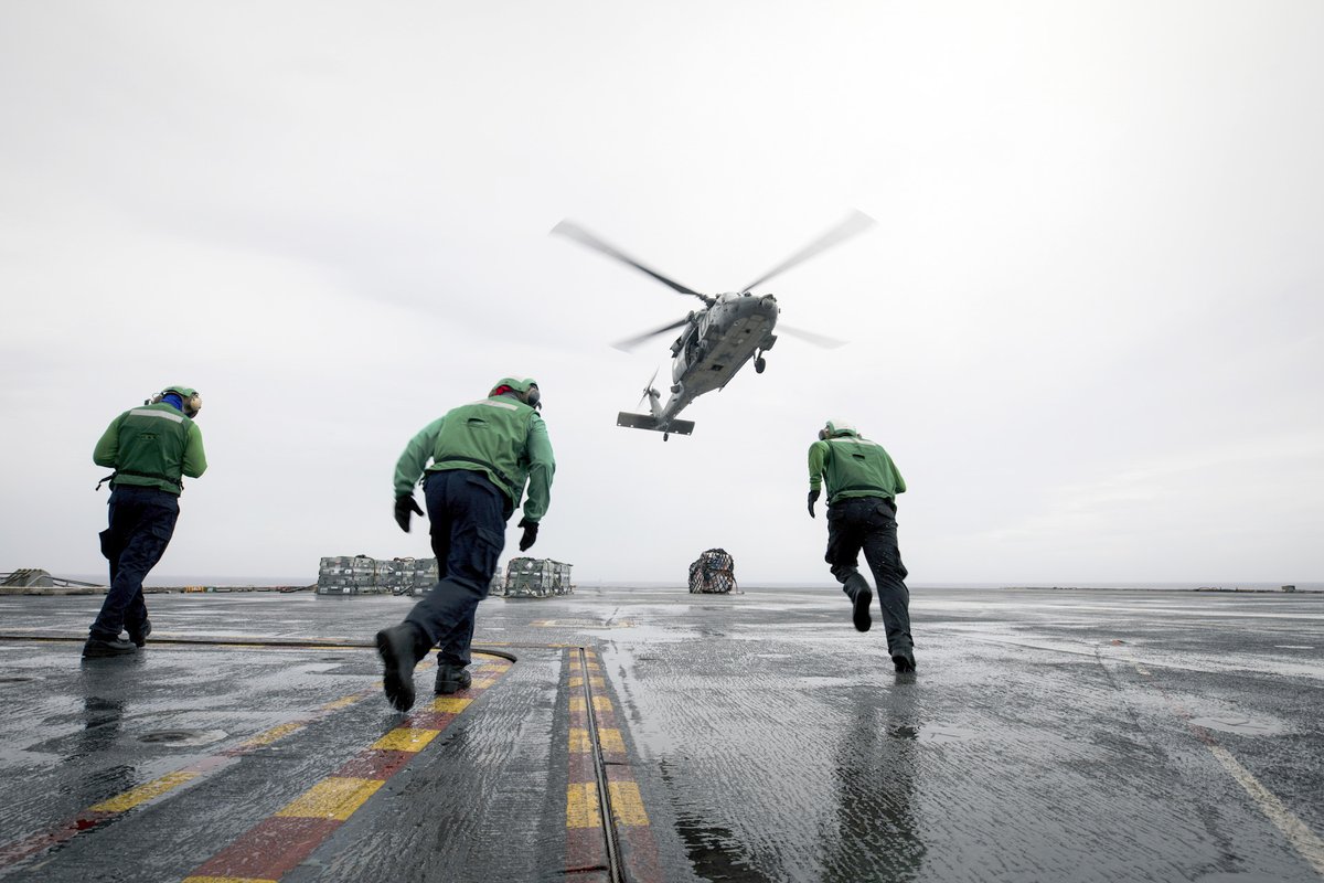USNavy's tweet photo. #USNavy Photos of the Day: 

1️⃣ #HS6 helicopter flies near #USSDecatur and 2️⃣ #USSNimitz @NimitzNews #VERTREP in the Pacific Ocean @US7thFleet @INDOPACOM
3️⃣ @LHD5 monitors air traffic and 4️⃣ #USSCarterHall transits the Atlantic Ocean @US2ndFleet
👉 https://t.co/aZddB6hxYf https://t.co/pKX0aVyeWz
