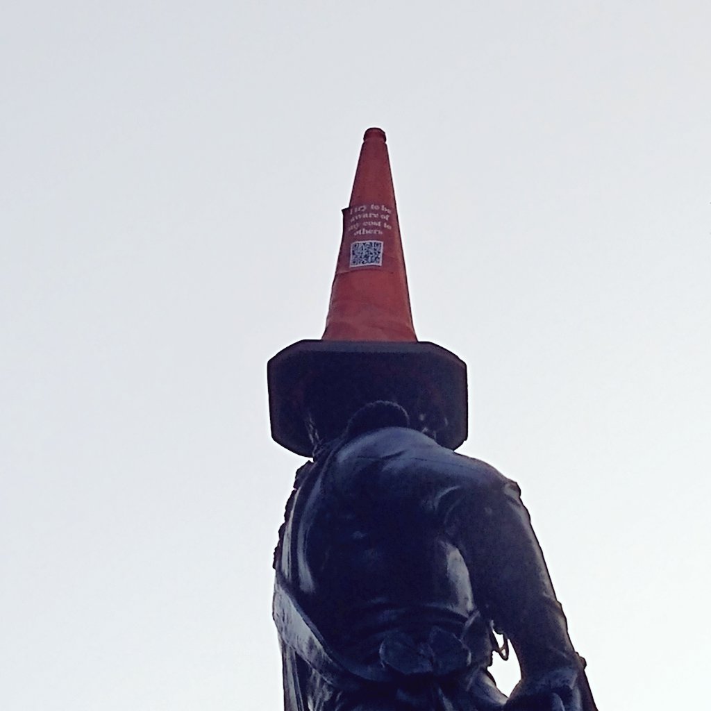 glasgowmixtape's tweet photo. What looks like a new cone has appeared on top of the Duke of Wellington's napper.

A message on the cone reads 'Try to be aware of my cost to others', along with a QR code 

#BanksyGlasgow #banksycutandrun https://t.co/6mAZhHZb3l