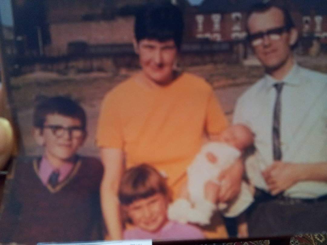 Love this family pic - looks like we're posing for council estate family of the year! Why were we all dressed up <a href="/philkirby/">Phil Kirby</a> - you and dad are wearing ties. Also, who took that pic?