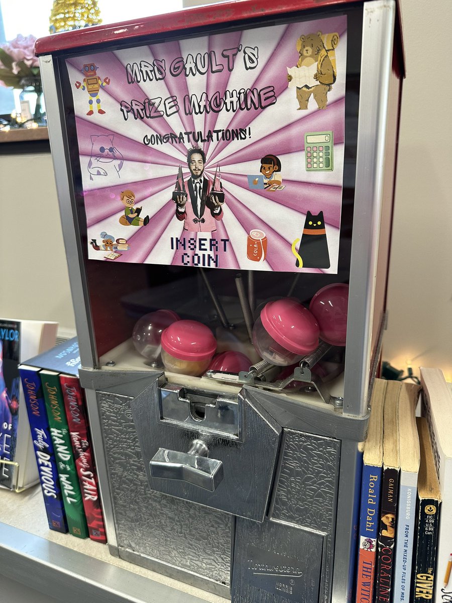 MrsGaultLJH's tweet photo. Things that just make sense in my @PostMalone themed classroom part 5. My Postie prize machine. You get a quarter for every unit test passed w 80% or higher. Almost empty, wahoo! That’s why they always say congratulations… https://t.co/ODfHzkGYT5