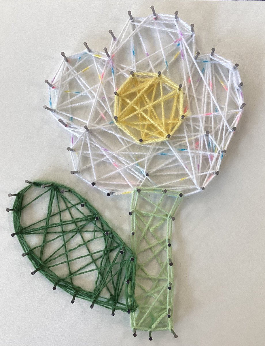 RavensdalePS's tweet photo. Phoebe, in Year 2, has been super creative with wool and nails - she has created a beautiful daisy with the help of her nanny! #RPSY2 https://t.co/ya8Isr0qVI