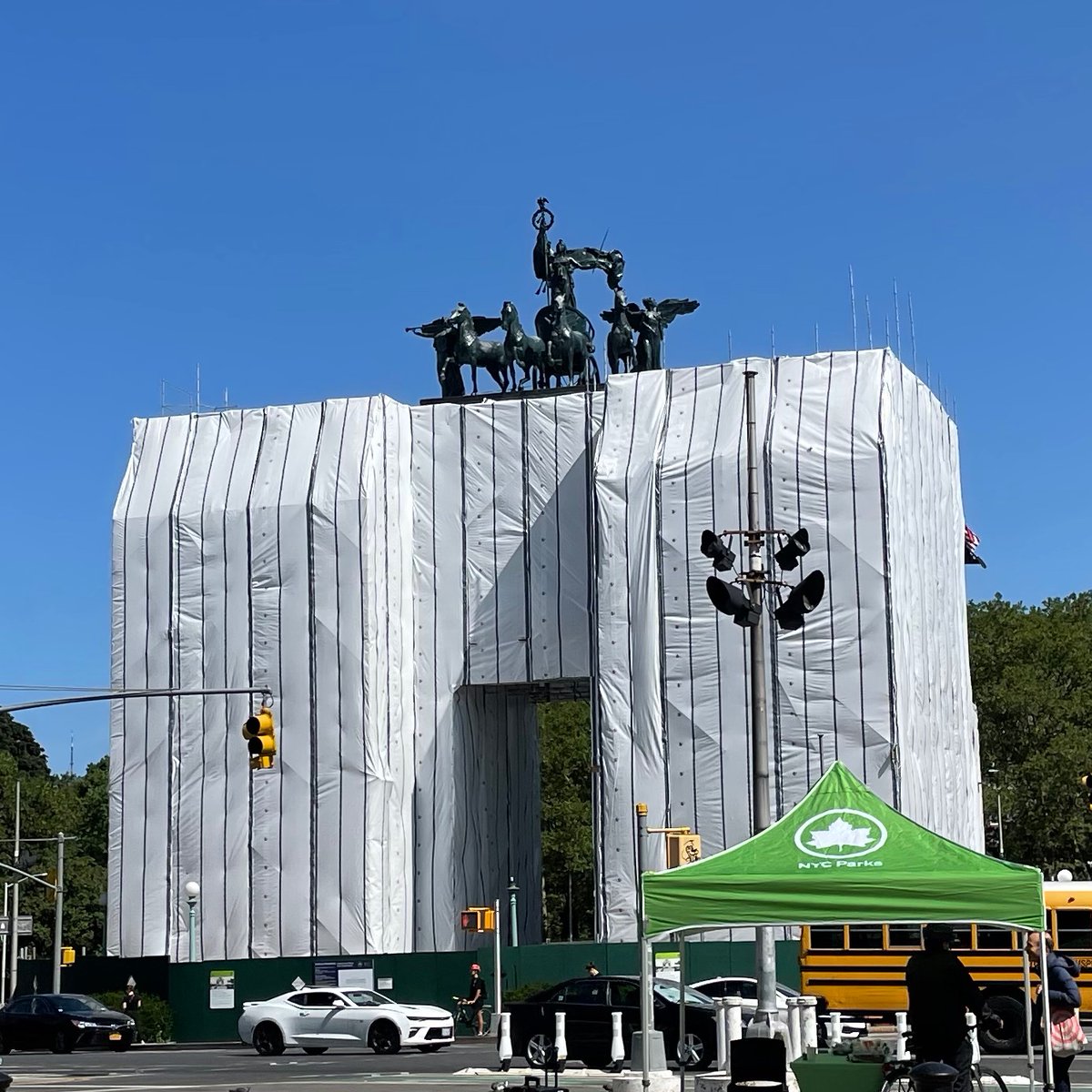 Behold the Grand Army Plaza arch, usually so familiar as to be mundane, now made beguiling and mysterious by wrappings…Christo and Jean Claude have done it again