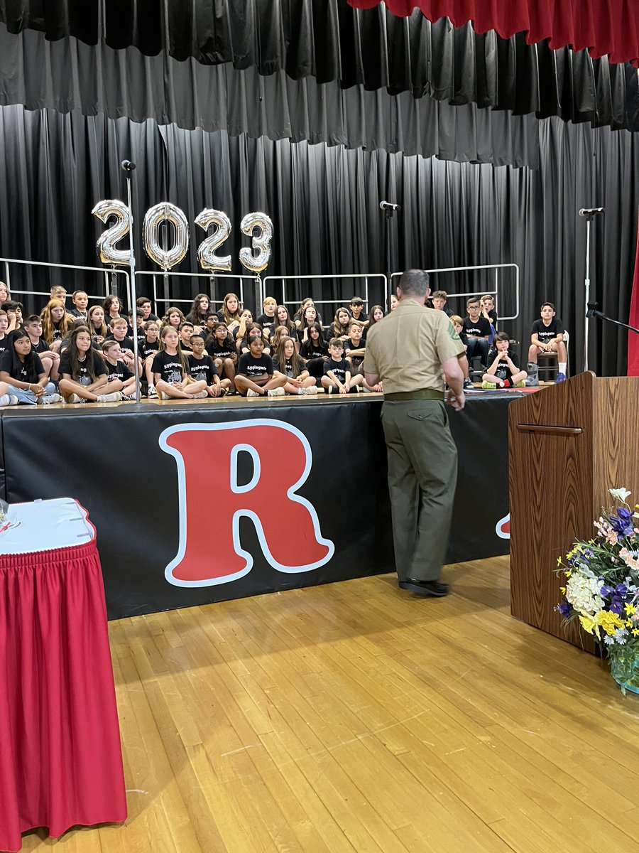 Sgt Clemenko speaks to the Applegate 5th graders about the characteristics of a hero: Honesty. Empathy. Respect. Optimism. Integrity. Courage.
