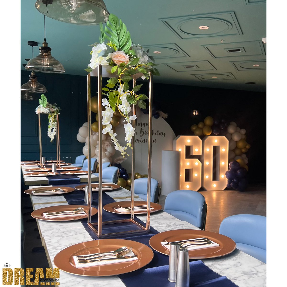 Asha_aw1's tweet photo. Had the pleasure of helping a young lady plan her mum’s 60th surprise birthday meal! She requested decor. We provided her with a personalised sailboard, balloons, plinth, LED numbers, table runners, charger plates, gold cutlery, gold centrepieces, flowers, sound to play music. https://t.co/EgI4WWLnea
