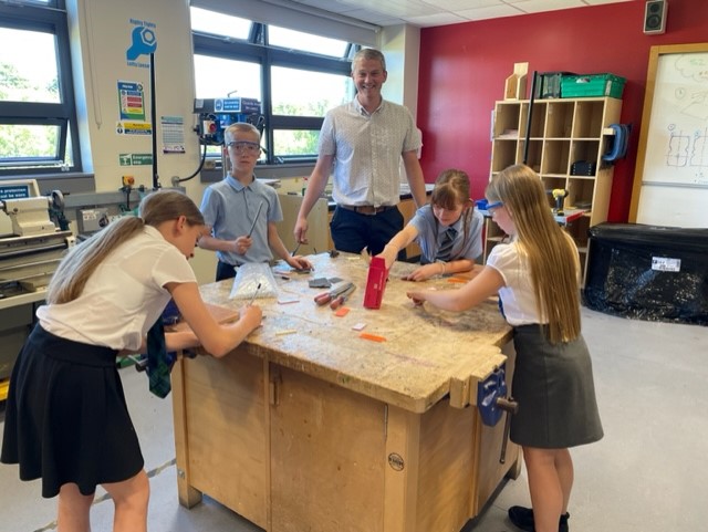 P7 visits...pupils are enjoying experiencing the workshop making acrylic plastic key chains <a href="/stbenedictsren/">St Benedict's High School</a>
