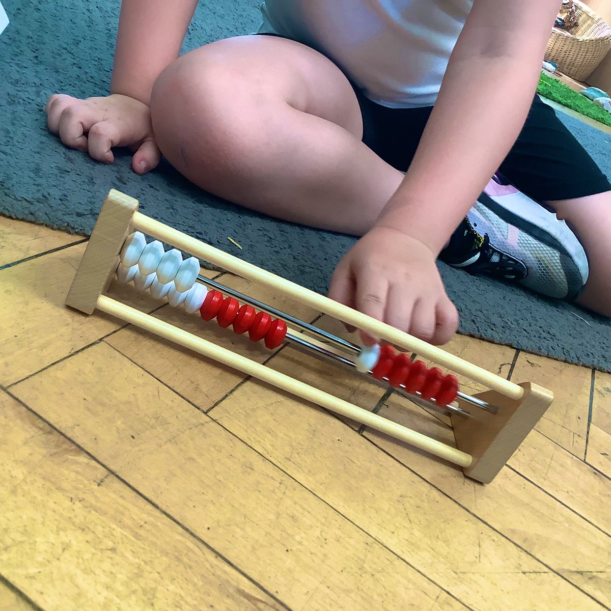 fairfieldnotts's tweet image. This week in RJD, we have been using Rekenreks for the first time, and are now able to use them independently! Here we are demonstrating, “One push, 6!” We know that 5 red beads and 1 white make 6 altogether. #MasteryMaths