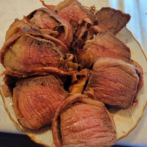 This rump roast recipe is super easy and delicious! It's perfect for entertaining or just as an everyday meal! #cookingTips #baconWrappedRoast