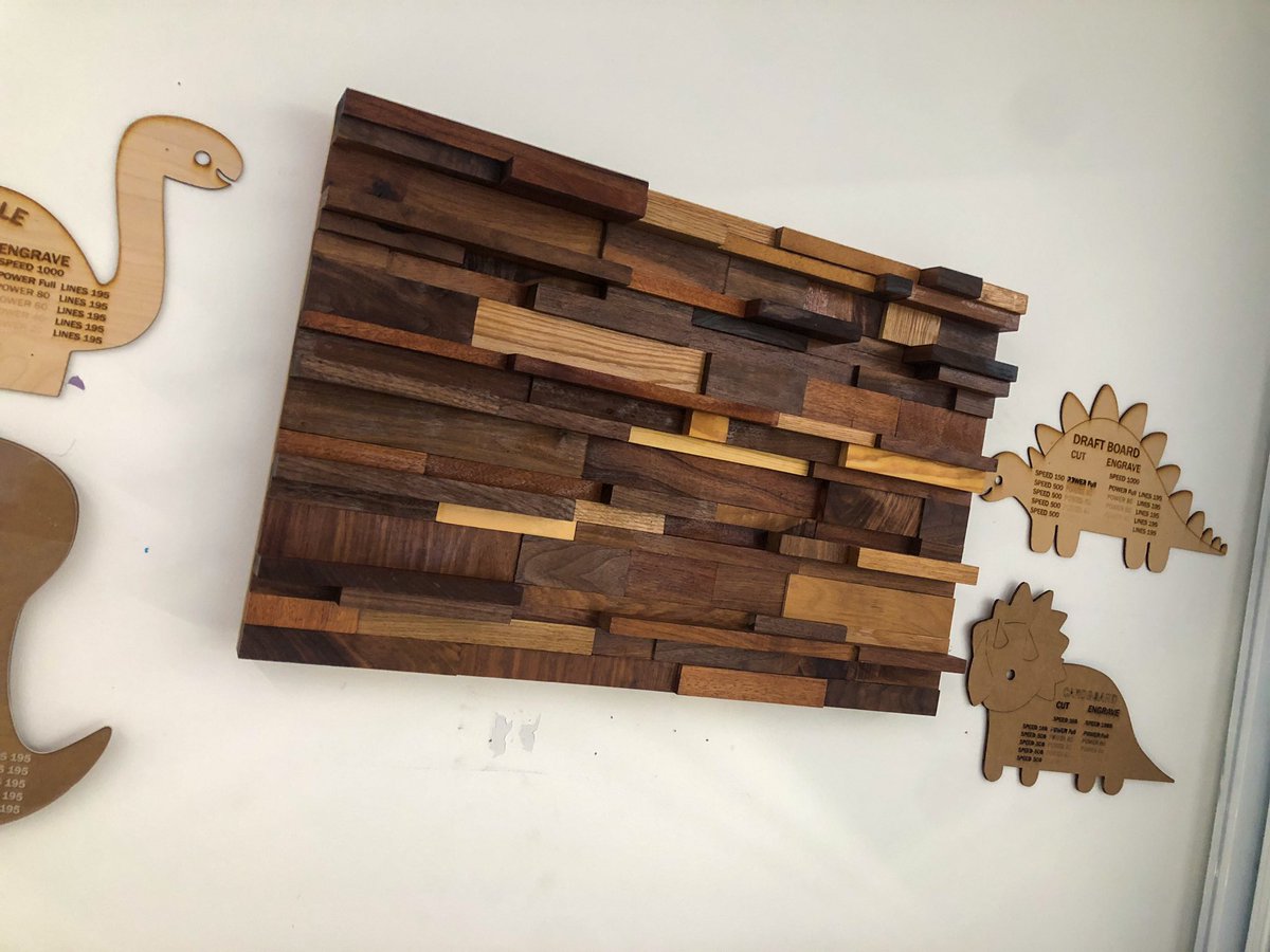 Wood Wall art to decorate the #STEAM lab was a huge success. A few of the student pieces hung up and they look fantastic. #makered #art #design #issedu #cisinspires