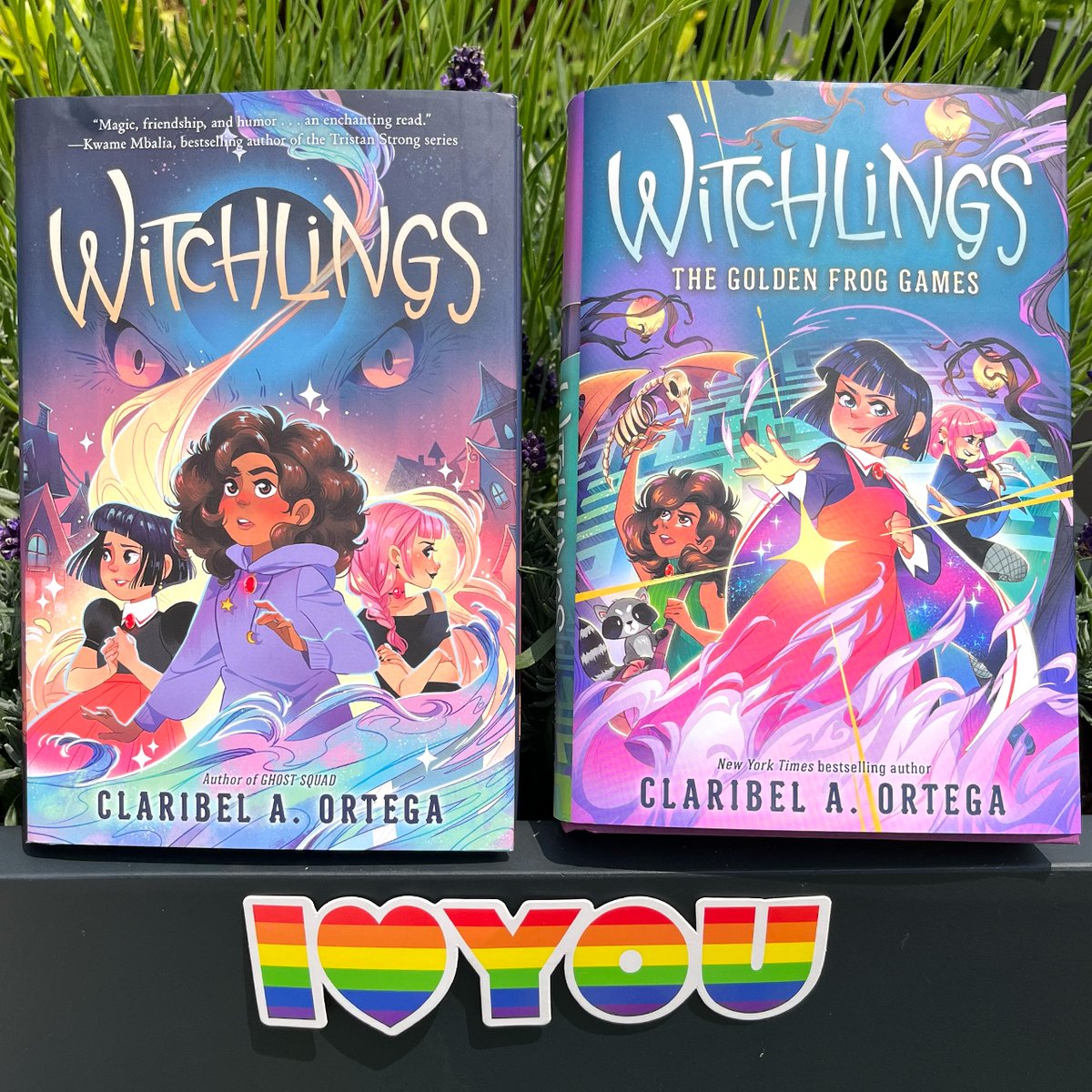 Scholastic's tweet photo. 🐸 Cozy up with WITCHLINGS, an enchanting LGBTQ-inclusive fantasy series by @Claribel_Ortega featuring thrilling magic, a captivating mystery, and a team of misfit witches pushing back against an unjust world ❤️🧡💛💚💙💜 #ReadWithPride https://t.co/SJfAnswuAc https://t.co/etiGE96De6