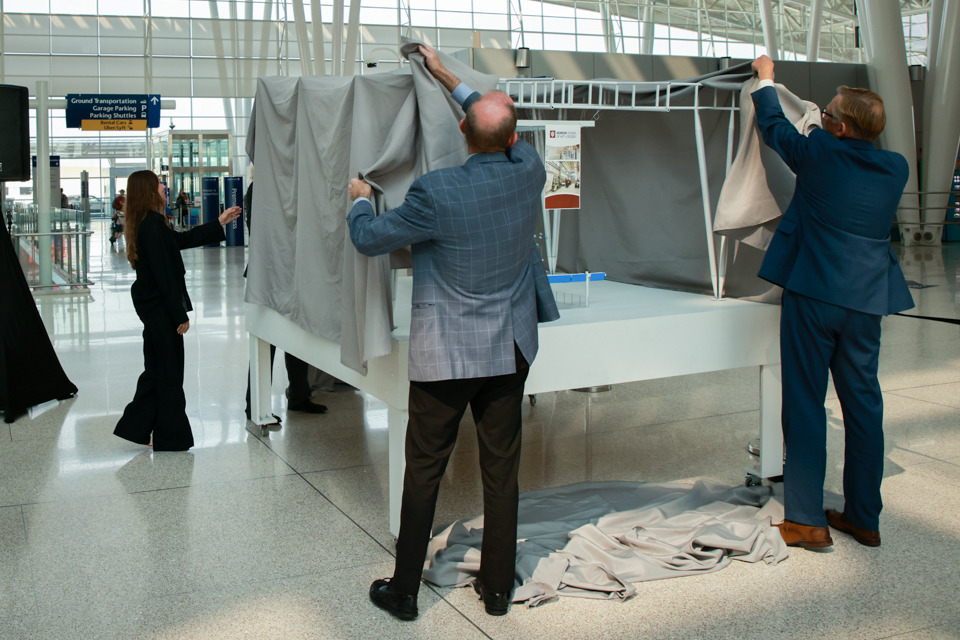 INTLCTR's tweet photo. Big news! We met up with our friends from @IAA_business &amp; @HerronSchool at @INDairport this morning to unveil the design and artist for the newest permanent art installation at Indy's airport... inspired by The Center's 50th anniversary. #IC50

Read more: https://t.co/3uTvfjl7qG https://t.co/xyYiB1MkUZ