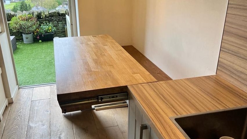 As well as #WorktopRestoration, I can help you discover the best ways to add additional #furniture to your living area, without it costing you precious space.

For a recent project, I installed an extra #countertop in my clients’ kitchen that doubles up as a sliding #dining area.