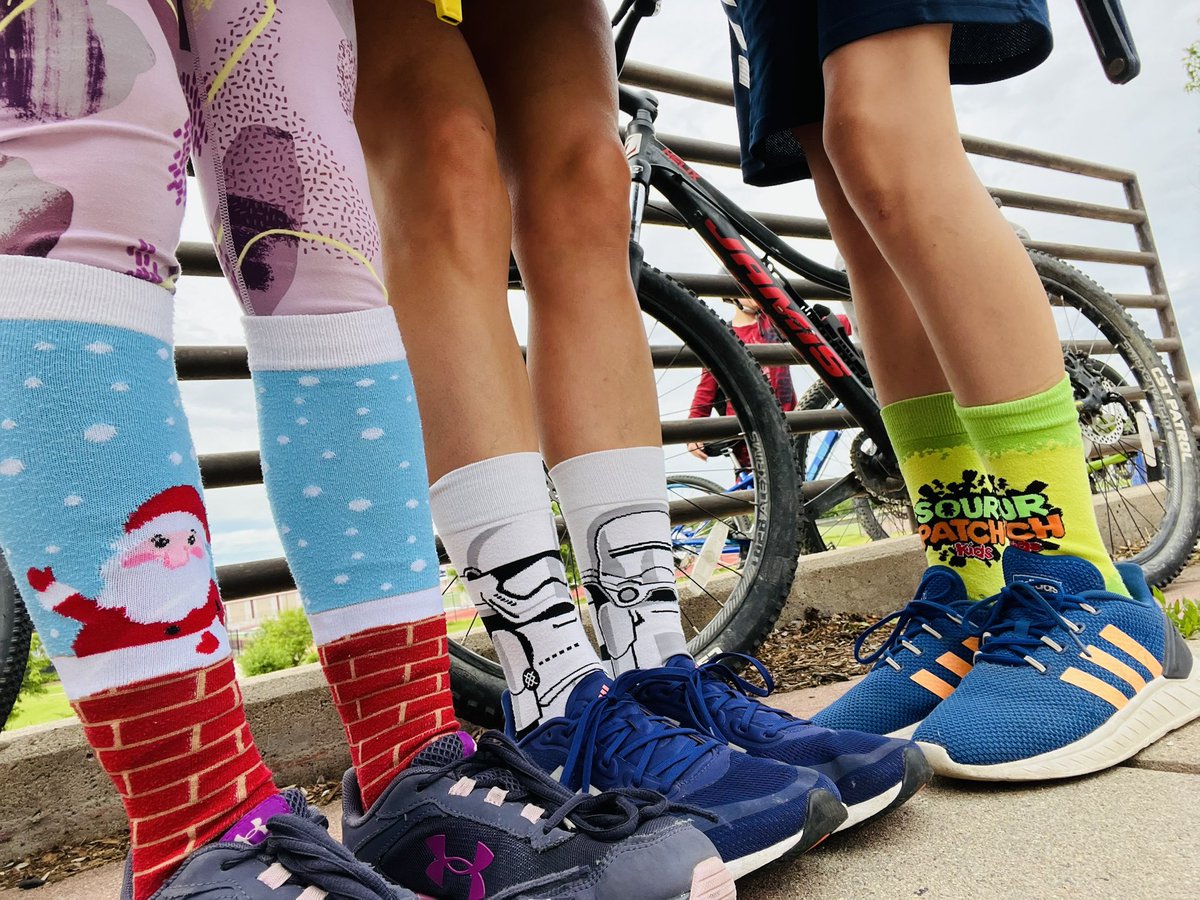 AKenreich's tweet photo. We are really enjoying using the @DenverDOTI neighborhood bikeways to get to @241Sports camp at South High School this week! Today is crazy sock day. https://t.co/xKfWu5FpF3