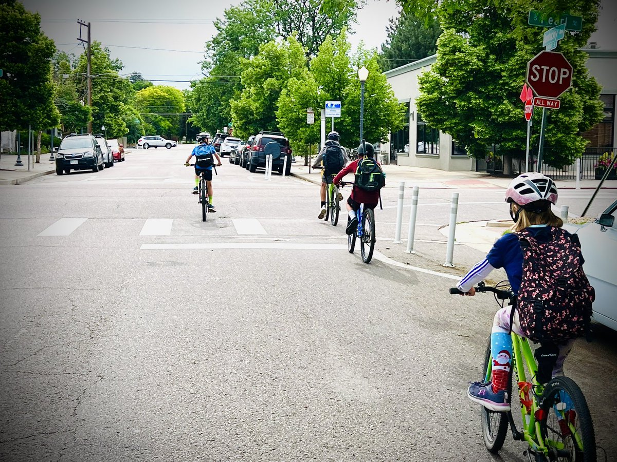AKenreich's tweet photo. We are really enjoying using the @DenverDOTI neighborhood bikeways to get to @241Sports camp at South High School this week! Today is crazy sock day. https://t.co/xKfWu5FpF3