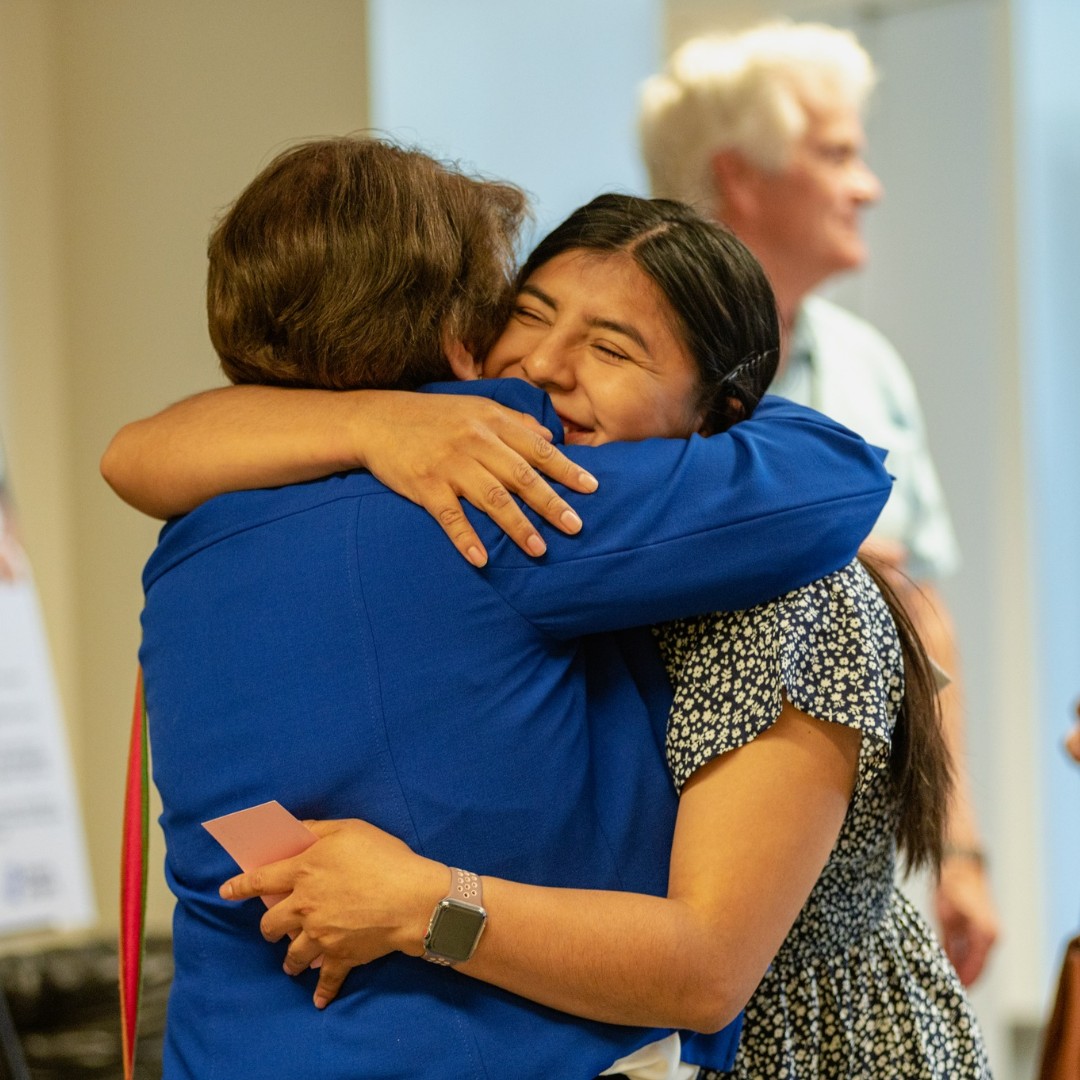 Get you a leader who can do both.

A shoutout to our founder, Dr. Emma Violand-Sánchez, who has always used her voice to advocate for immigrant rights and can command a packed room with ease and dignity.

(She also gives great hugs.)