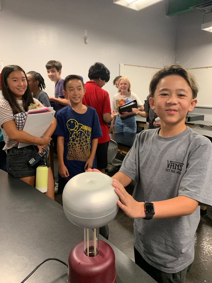 BLAST FROM THE PAST: Looking back at Ms. Wang's 7th grade Physics class. They participated in an electrostatics lab and students were able to touch the Van De Graaff generator and experience the static electricity charge. What an electrifying learning experience!