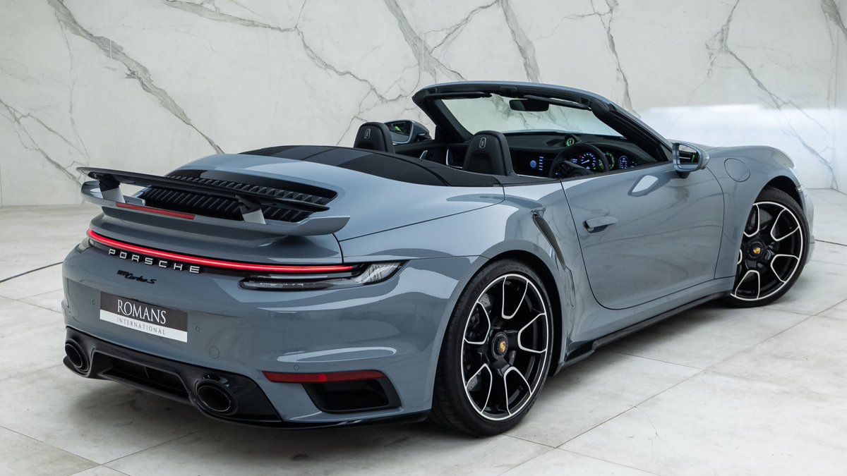 Arctic Grey, stripes which are woven into the fabric roof and a hint of 🦎

Don't think we've seen a Turbo S Cab which has quite so much presence!