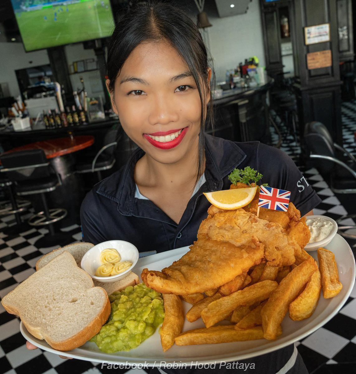 Fish and chips are available all day, every day, seven days a week. We can offer you a choice of cod or haddock. either coated in beer batter or golden breadcrumbs, served with our famous beef dripping chips. mushy peas, tartare sauce, bread, and butter @ Robin Hood, Pattaya