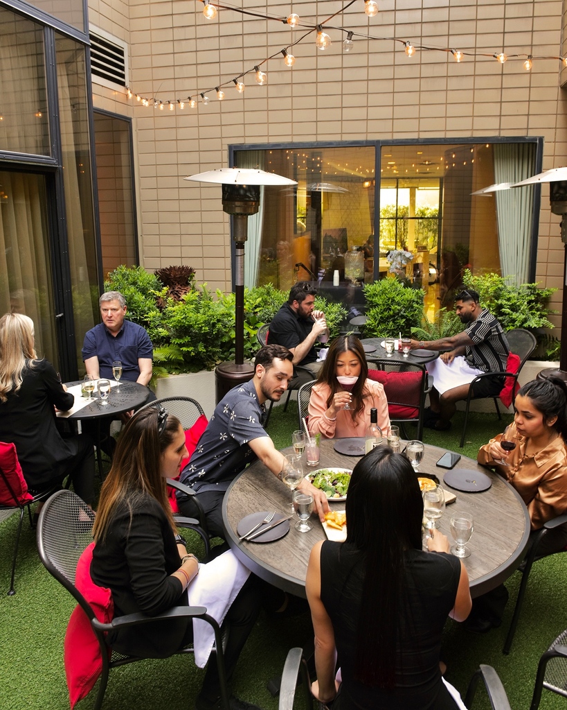 Embrace the sun-kissed vibes and enjoy our patio oasis! ☀️😍 Indulge in the perfect blend of nature and city life as you dine in our quiet garden courtyard or enjoy the bustling energy of our front-facing patio on Robson Street.