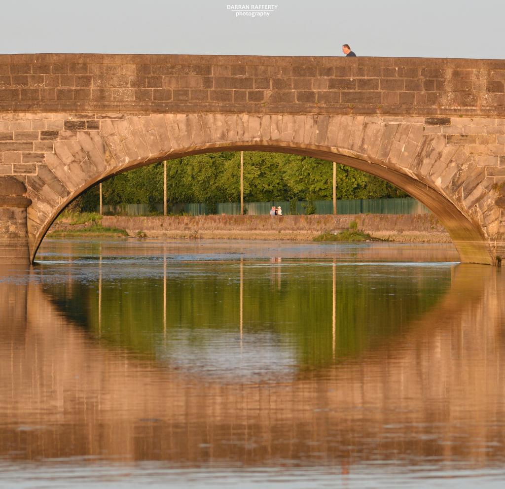 Dundalk_Photos's tweet photo. Looking down onto the fairgreen, through the arches of the Castletown Bridge at sunset last night in #Dundalk https://t.co/gnr1SuOFmY