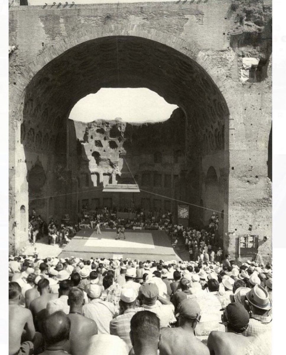 Wrestling in the remains of the Basilica of Maxentius and Constantine at the 1960 Summer Olympics Games, Rome, Italy. One of the reasons the Rome 1960 games was so well remembered (from the ever dwindling era of those who witnessed it) is that it was the first to be heavily…