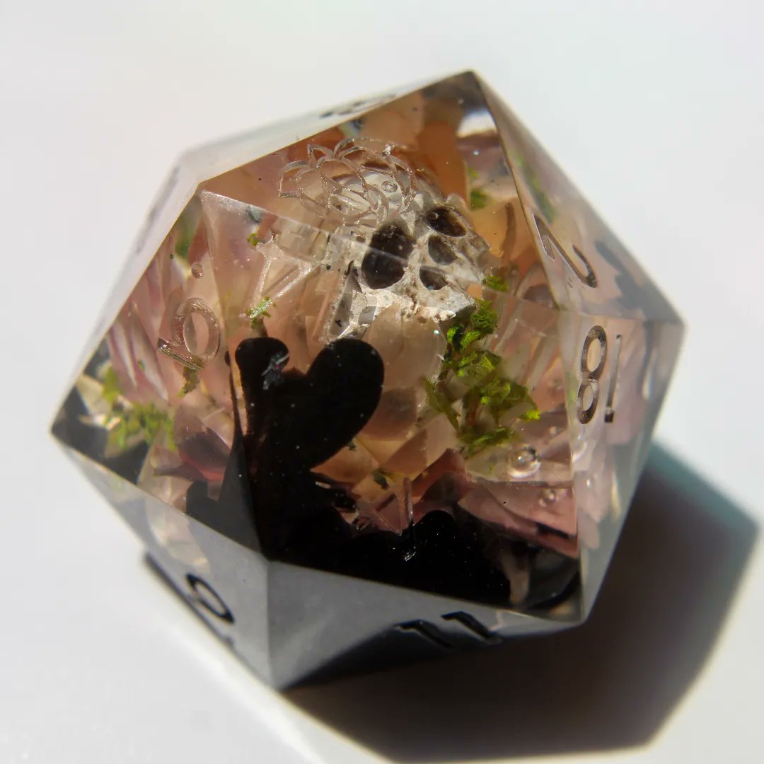 Helichrysumdice's tweet photo. Deathly Bloom 💀
Oh look, a cute flower.. but wait, what's inside? 👀
#dnd #handmadedice #artisandice #skull #dnd5e #d20 https://t.co/L7lEGIG2KY