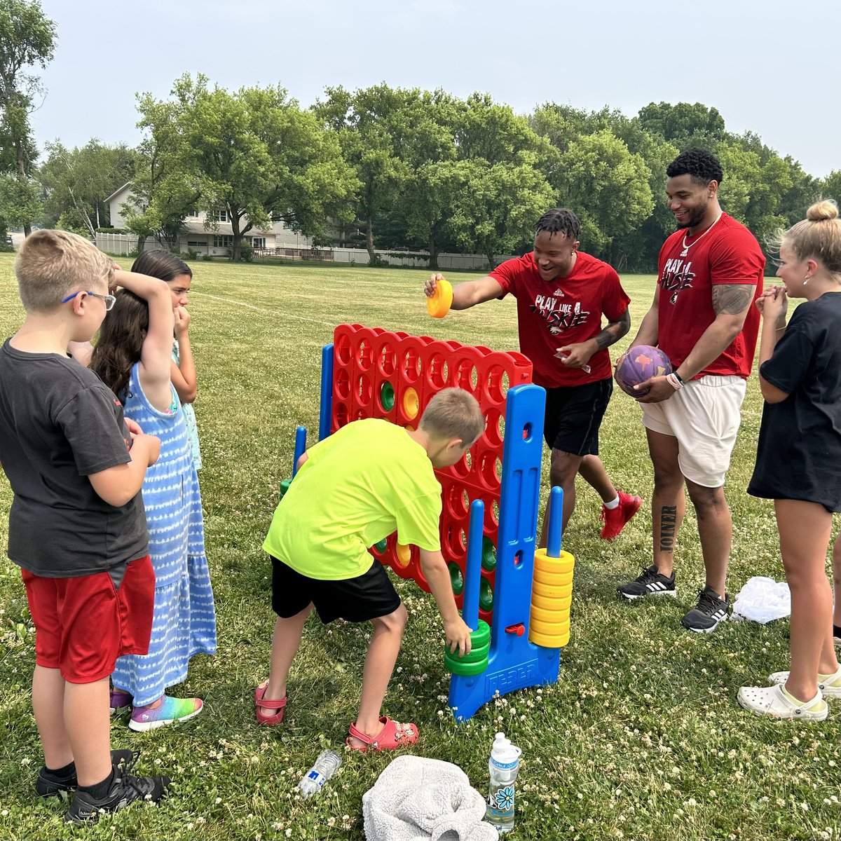 NIU_Football's tweet photo. Great time playing with the @SYC427 OSCAR pups today. Surprise, surprise… we were the last ones off the playground! #BackFlipBackFlip #theHardWay https://t.co/PXx7hVLz2B