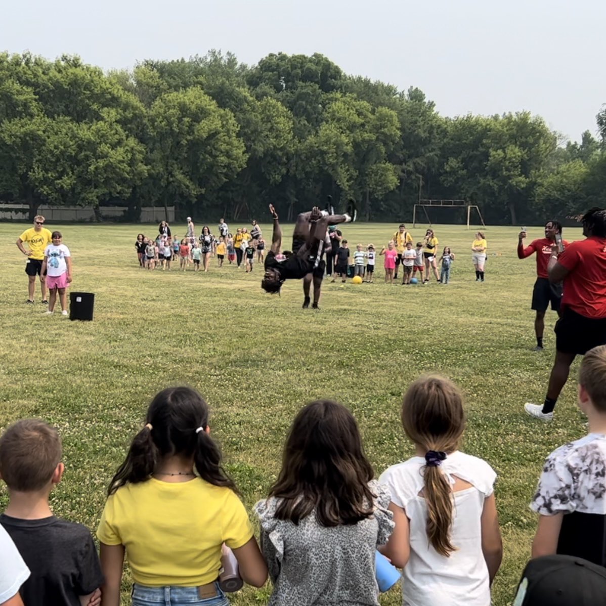 NIU_Football's tweet photo. Great time playing with the @SYC427 OSCAR pups today. Surprise, surprise… we were the last ones off the playground! #BackFlipBackFlip #theHardWay https://t.co/PXx7hVLz2B