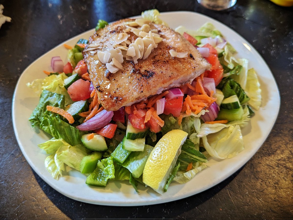 When on #ManitoulinIsland, you cannot leave without enjoying some of the local whitefish! The Anchor Inn Hotel in #LittleCurrent is the perfect spot to indulge with their light but filling whitefish almandine salad! #TMACtravel #TMACSudbury