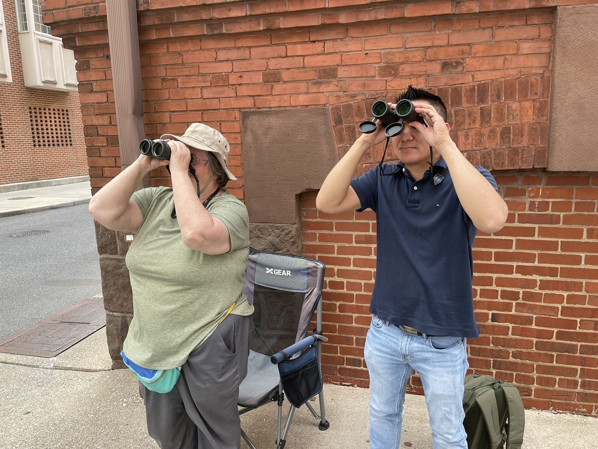 RichNegrin's tweet photo. One bird yearns to fly, drops around 10 stories or so and what now? A community holds its breath and keeps a watchful eye. Thanks Falcon volunteers Sue Hannon & Phuong Lee for keeping vigil tonight. (And thanks for the selfie with me). You guys rock and can join #TeamDEP anytime. @FalconChatter @PennsylvaniaDEP