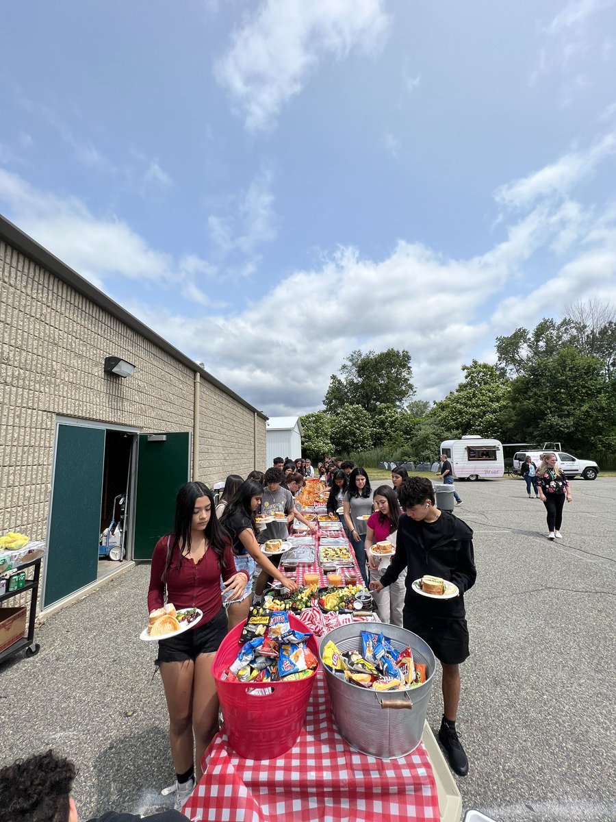 MacKinnon Class of 2023 enjoy a picnic with classmates and their teachers.