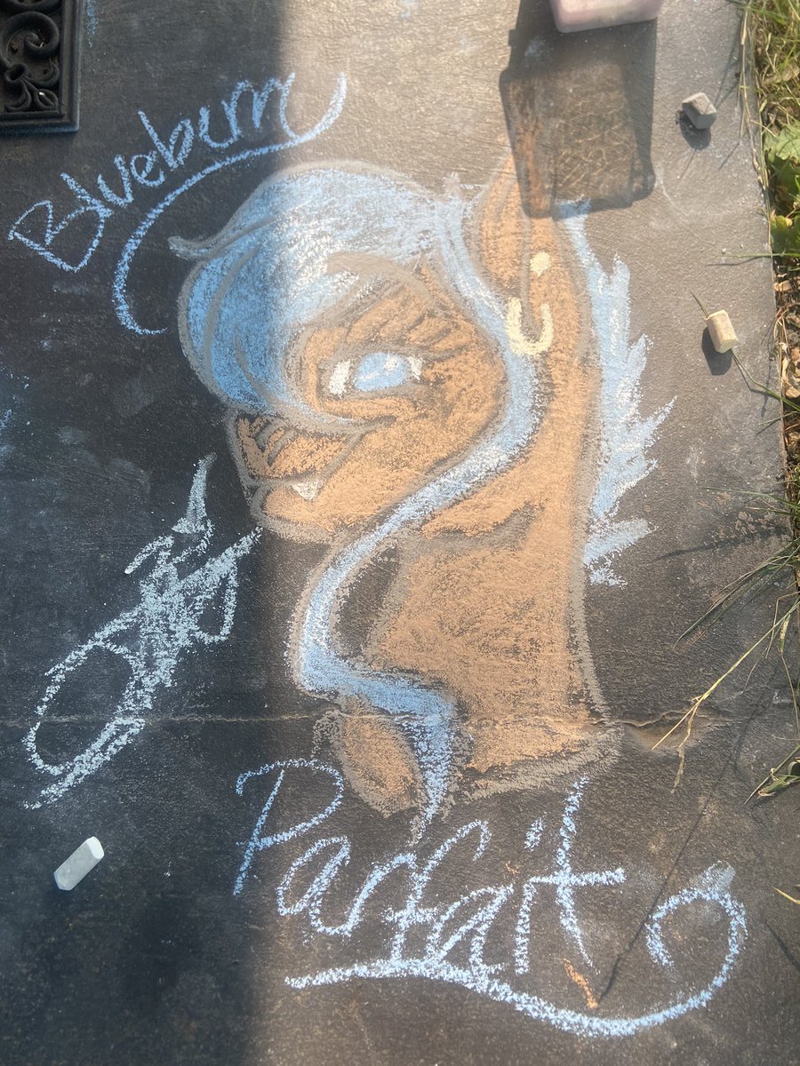 have some chalk art of my mare! i was limited with colors and chalk since this was at a shaved ice parlor