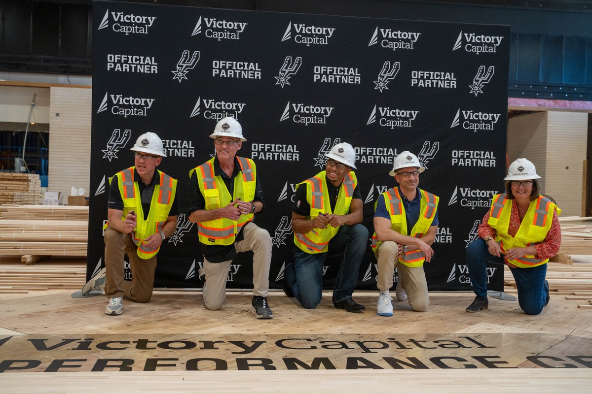 JeffGSpursZone's tweet image. The Rock is slowly coming together, #porvida fans.

Spurs &amp;amp; Victory Capital held a ceremony to sign the basketball court subfloor at the Victory Capital Performance Center. Peter J. Holt, RC Buford, Keldon Johnson, Victory Capital Chairman &amp;amp; CEO &amp;amp; Victory Capital Chief Marketing…