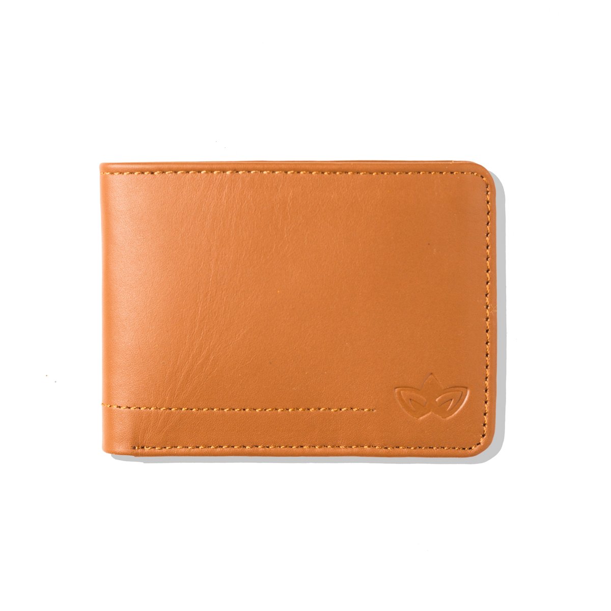 NrthElfOfficial's tweet photo. "When minimalism meets brown magic. The Atom in brown is the 'pocket-size adventure' you never knew you needed. It's small, it's mighty, it's brown-tastic!
#northelf
#wallet
#minimalism https://t.co/vWHhAMNI8o