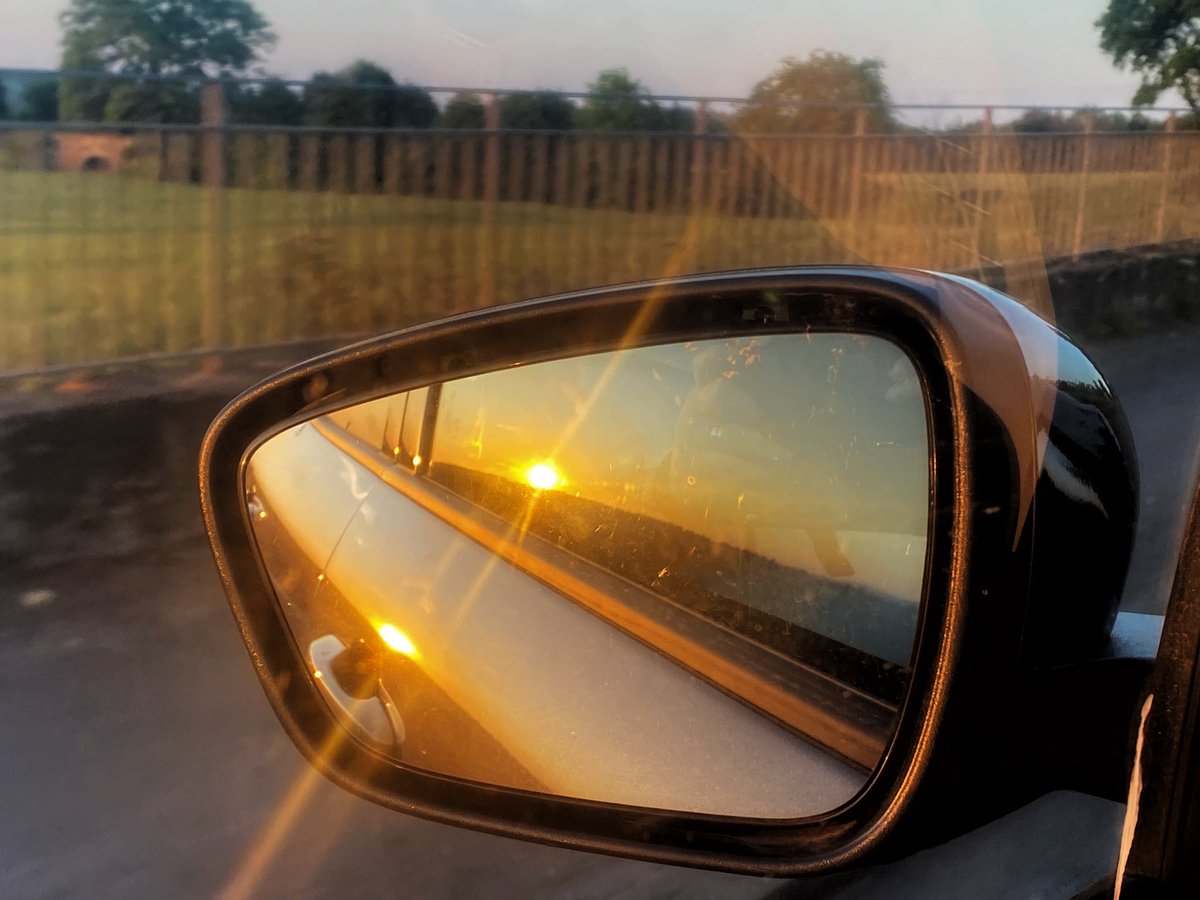 VWFPhotography's tweet photo. Leaving the sunset behind. Side mirror sunset! #sunset #sunsetphotography https://t.co/NosKMf9Ndx