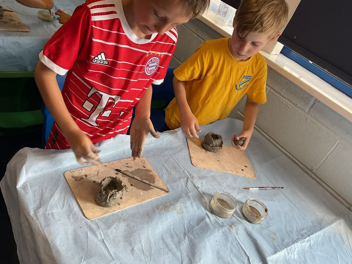 broadwayprimary's tweet photo. Year Two are busy using clay to make some pinch pots. They have used slip and score to join different pieces of clay together. #BroadwayArtists #ClayPlay https://t.co/bpzkYSZj3I