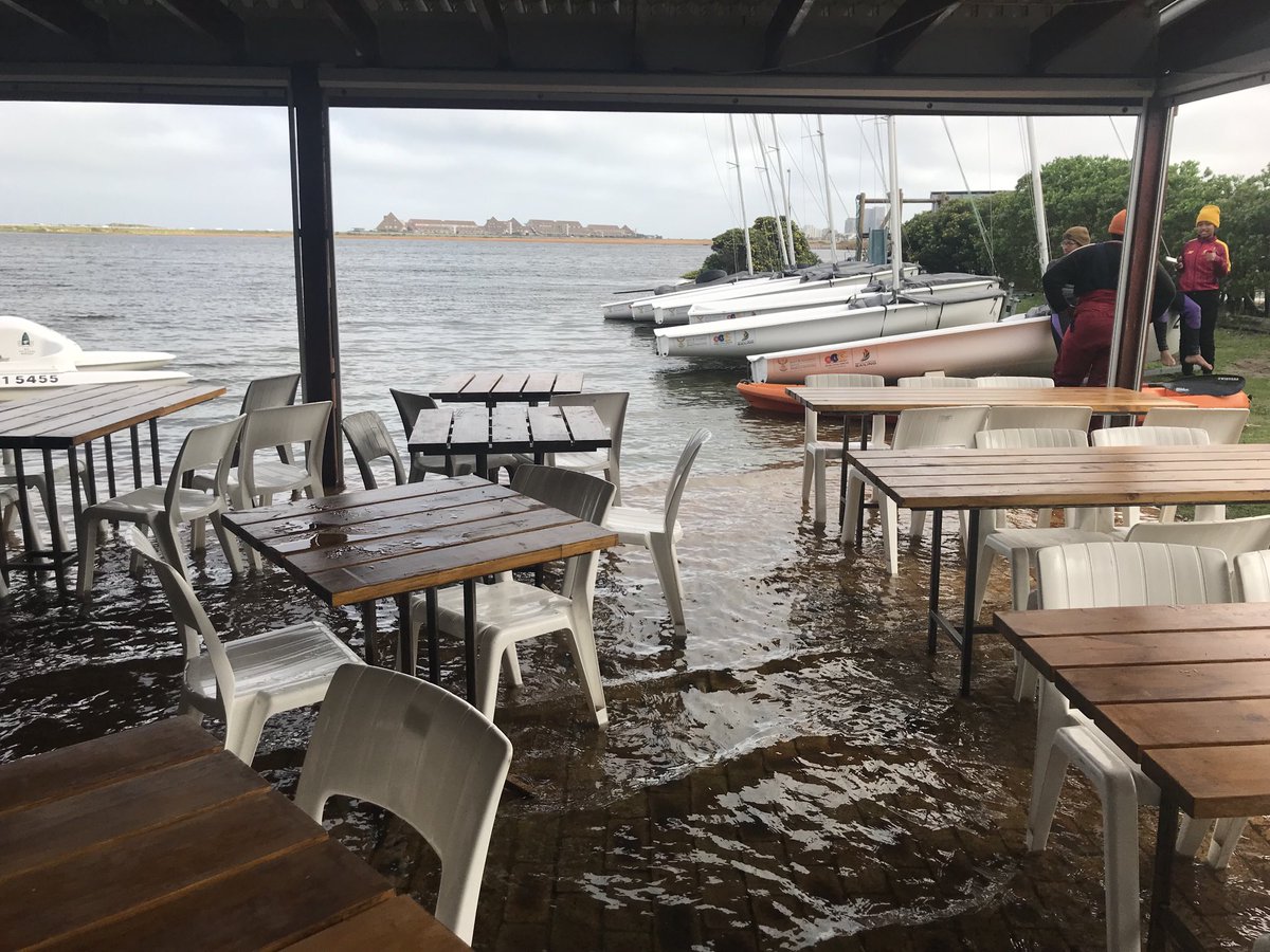 The outside seating area of the Milnerton Aquatic Club with Dolphin Beach in the distance. #CapeTownRain