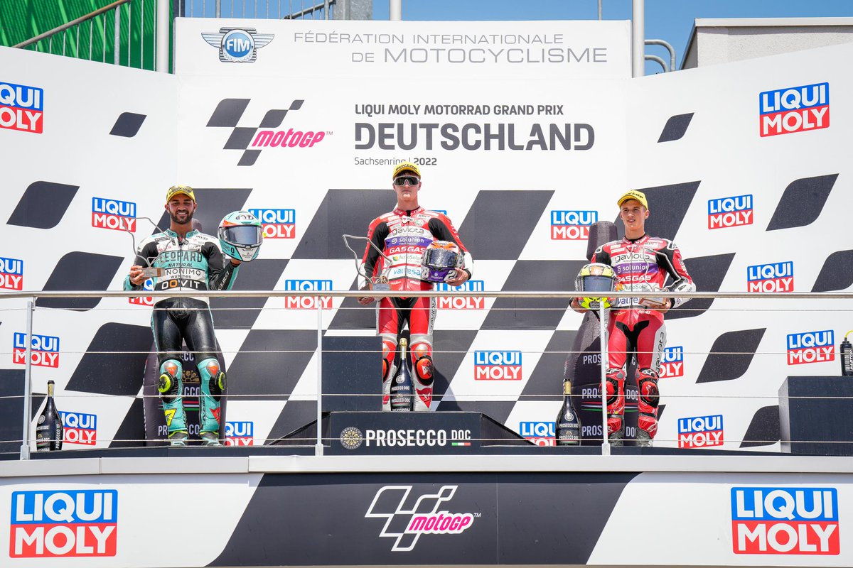 MartinoMoto's tweet photo. #RememberMotoGP #German #Moto3 2022. Victoria de @IzanGuevara28 escoltado en el podio por @dennisfoggia71 y @garciadols11 (foto @MotoGP) https://t.co/bUuyv24z4g