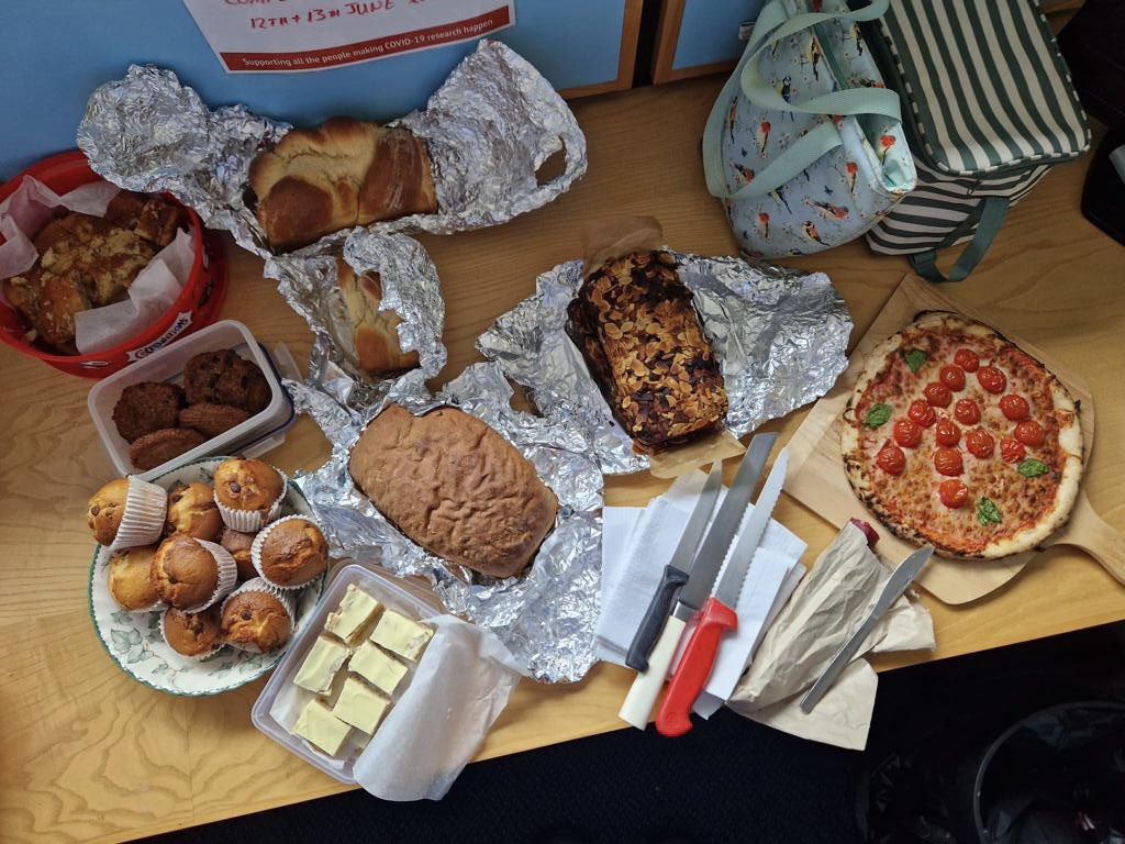 Nursing and Clinical team at WTCRF celebrating #Red4Research with a bake off #bREaD4Research 😋