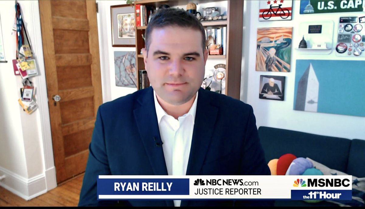 Strong Justice Department reporter setup. Press passes. The Scream. His photos. NBC Peacock pillow. 10/10 @ryanjreilly