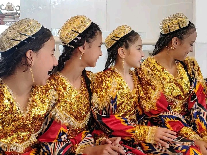 Wonders of #CentralAsia. Smiling girls👧👧 dressed in national clothes. Very cute,😊 isn't it?