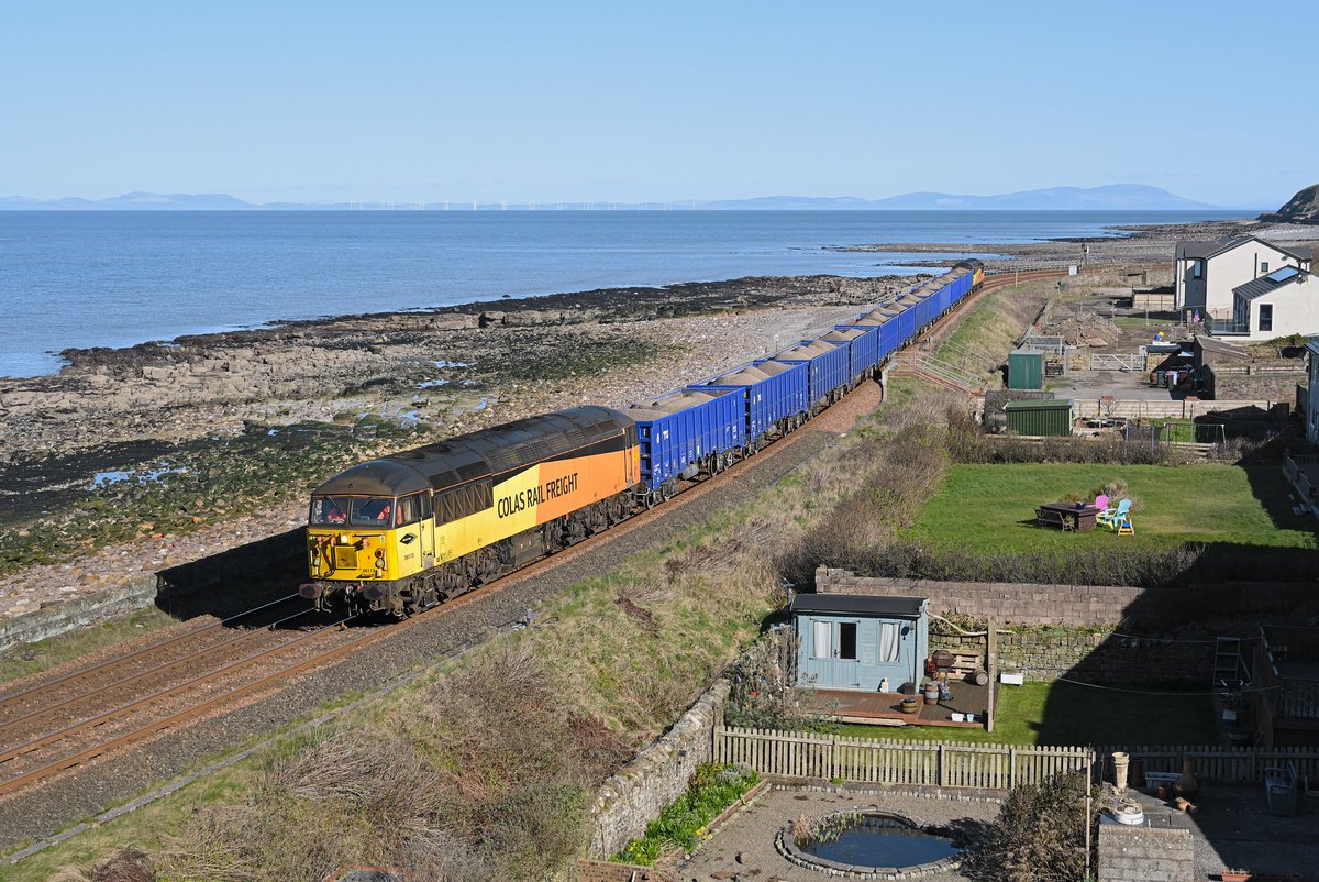 Cumbrian Coast Grids.

56078 skirts the Irish Sea as it passes the pebbled beach of Flimby and, after a reversal at Maryport, 56113 is then seen easing through Parton on 27/03/23 with the 6Z87 08:38 Workington Docks to Drigg BNF. @ColasRailUK #FreightFriday #CumbrianCoast