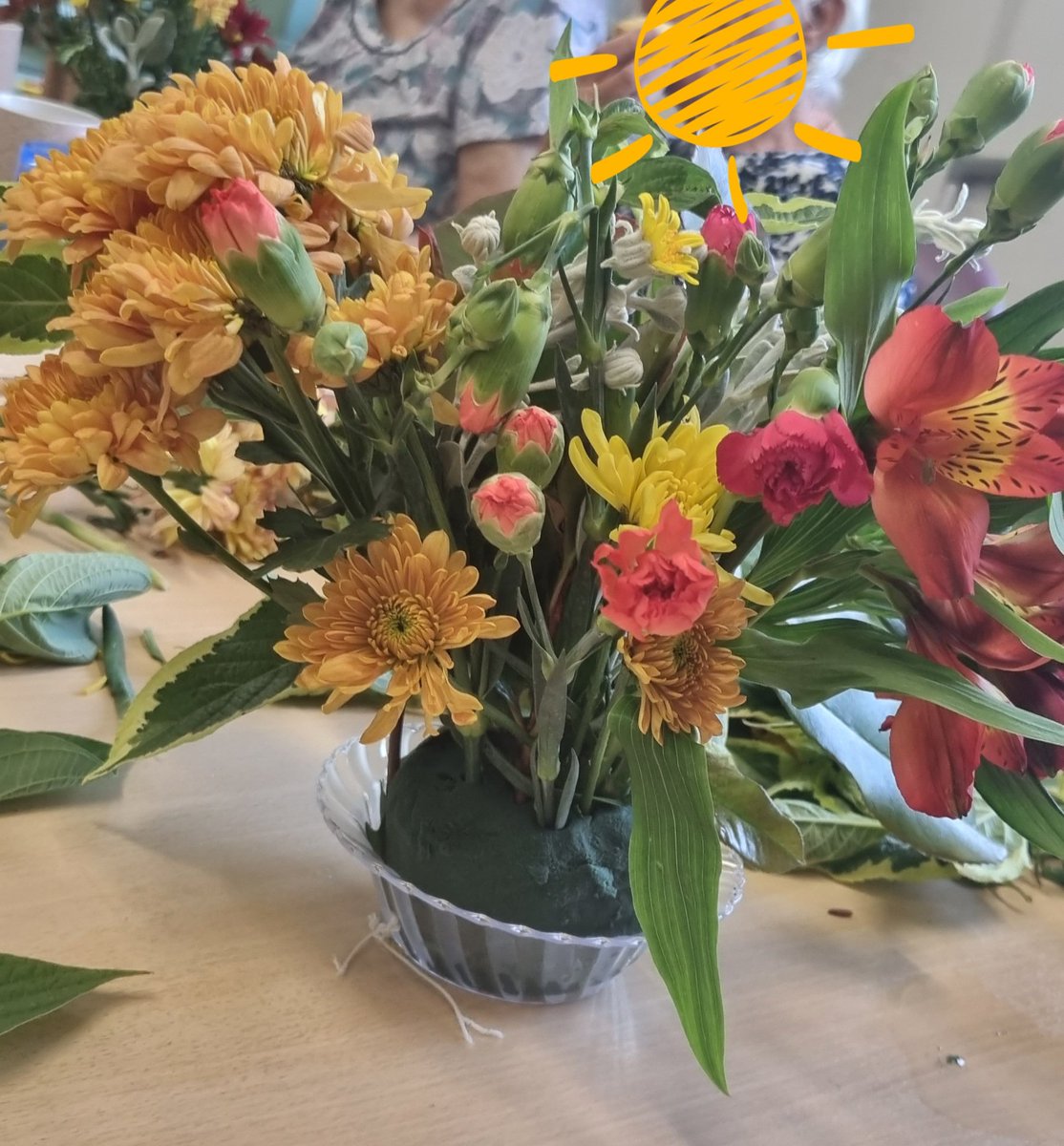 SedgemoorMas's tweet photo. It was the last CST group for our latest cohort today. They spent time making these lovely floral arrangements to take home. This led to lots of chat about the various states of our gardens! #CST #activity #occupation #livewellwithdementia https://t.co/RkXUiQ4r48